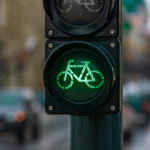Closeup of a traffic signal with a bicycle shaped green light